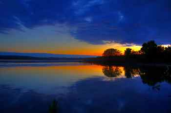 calm body of water during golden hour, sunset lake, trees, orange HD wallpaper