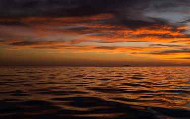 body of water during golden hour, sunset, ocean, sea, burning sky HD wallpaper