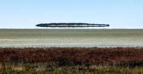 fata morgana mirage looks like ufo above the desert