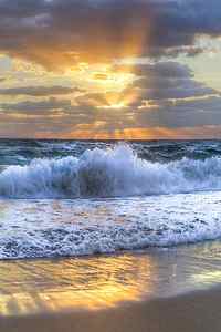 Wall Art - Photograph - Splash Sunrise by Debra and Dave Vanderlaan