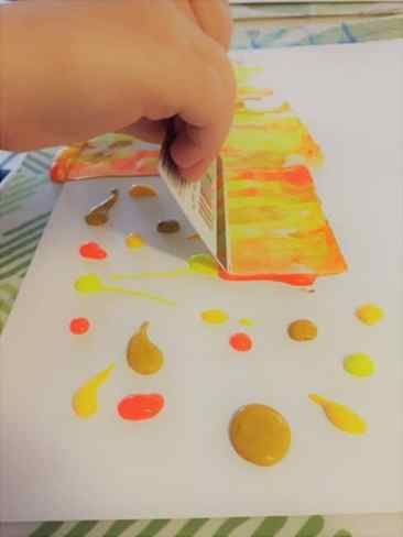 Create a colorful Fall painting with this easy Autumn landscape art activity. This scrape painting technique is simple enough for toddlers and preschoolers!