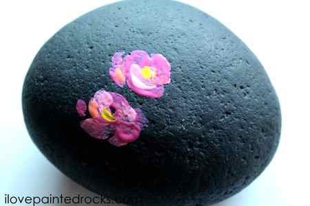 flowers on painted rock