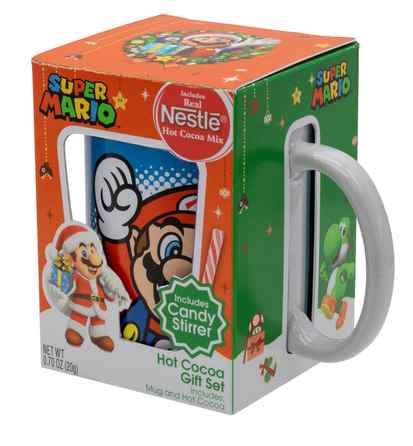 Angle of orange and green christmas themed box with white mug handle sticking out 