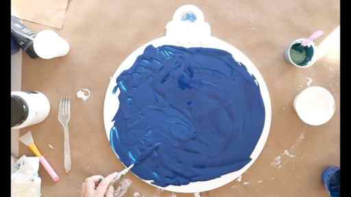 how to paint snow, lay down base coat of dark blue paint and spread out with palette knife