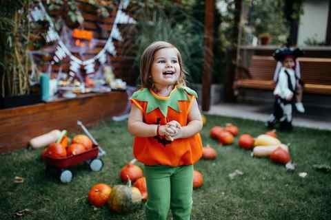 playful kids enjoying a halloween party