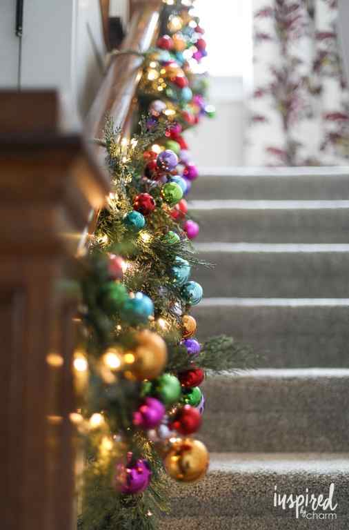 colorful rainbow ball garland on banister.