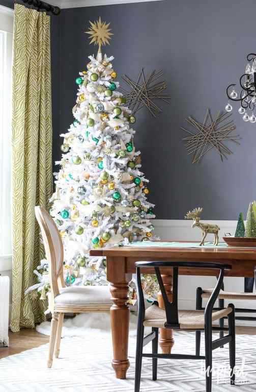 white, green, and gold Christmas tree.