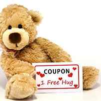 Teddy bear with hug coupon by Blink Images