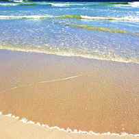 Sandy Beach And Ocean On A Sunny Day by Johan Swanepoel