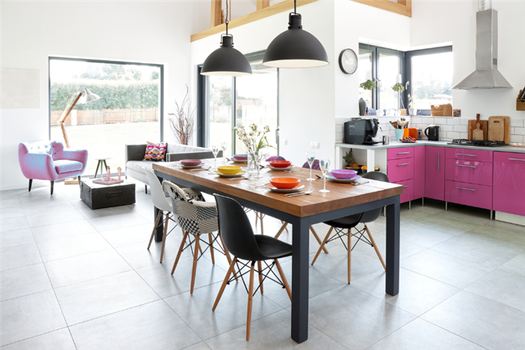 Modern kitchen and dining table with bright magenta accents