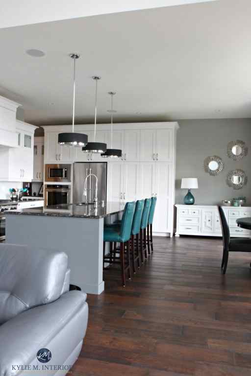 Open layout white kitch with gray painted island, teal accents. Sherwin Williams Dorian Gray. Kylie M Interiors E-decor, Online Consulting, decorating and design