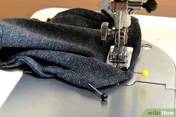 Step 7 Sew the hems, ⅛ to ¼-inch (0.32 to 0.64-centimeter) away from the raw edge.