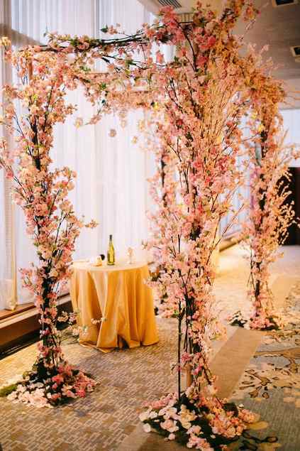 chuppah with cherry blossoms - via theknot.com