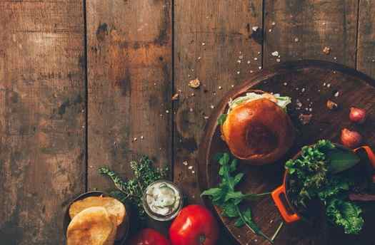 Food photography of hamburger and ingredients on a DIY background