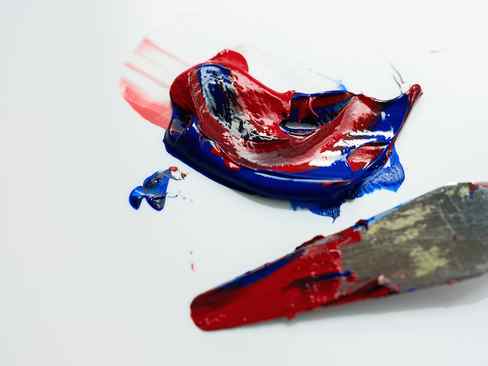 Mixing Red and Blue Acrylic Paint with a Palette Knife