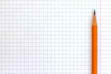 graph paper and an orange lead pencil 