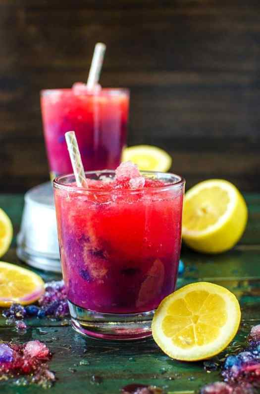 Color Changing Purple and Pink Lemonade Slushies & Popsicles - These kid friendly treats are as magical as they are delicious! You kids will absolutely LOVE these! Have fun with your food while you cool down this summer with these beautiful naturally colored, homemade, color changing lemonade slushies!