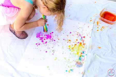 Are you looking for a fun art project for kids? Grab the bubbles and try this painting activity!