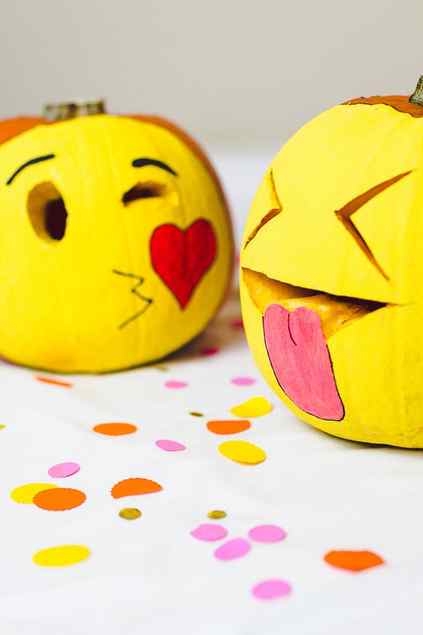 painted and carved emoji pumpkins